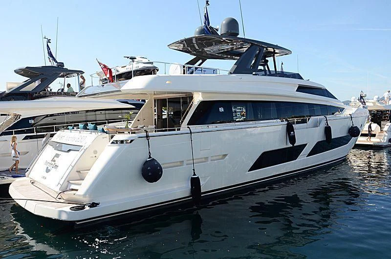a white yacht on the water aboard E3 Yacht for Sale