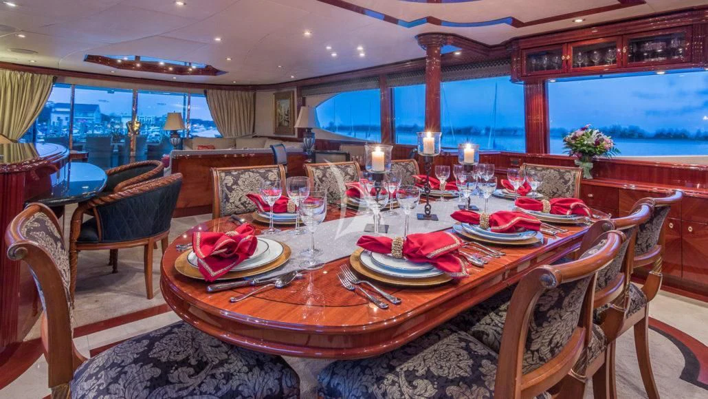 a dining table set for a dinner aboard CEDAR ISLAND Yacht for Sale