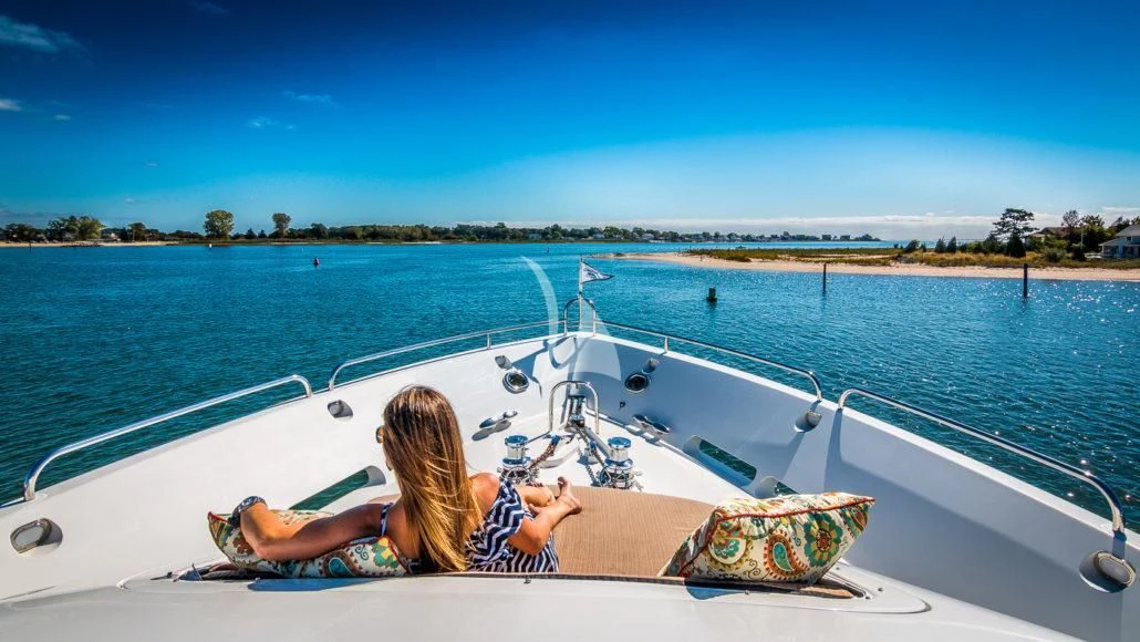 a person sitting on a boat aboard CEDAR ISLAND Yacht for Sale