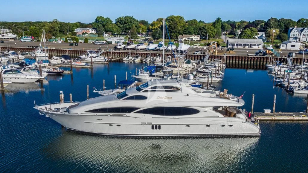 a boat docked at a pier aboard CEDAR ISLAND Yacht for Sale