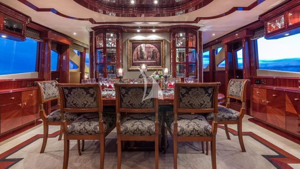 a room with chairs and a table aboard CEDAR ISLAND Yacht for Sale