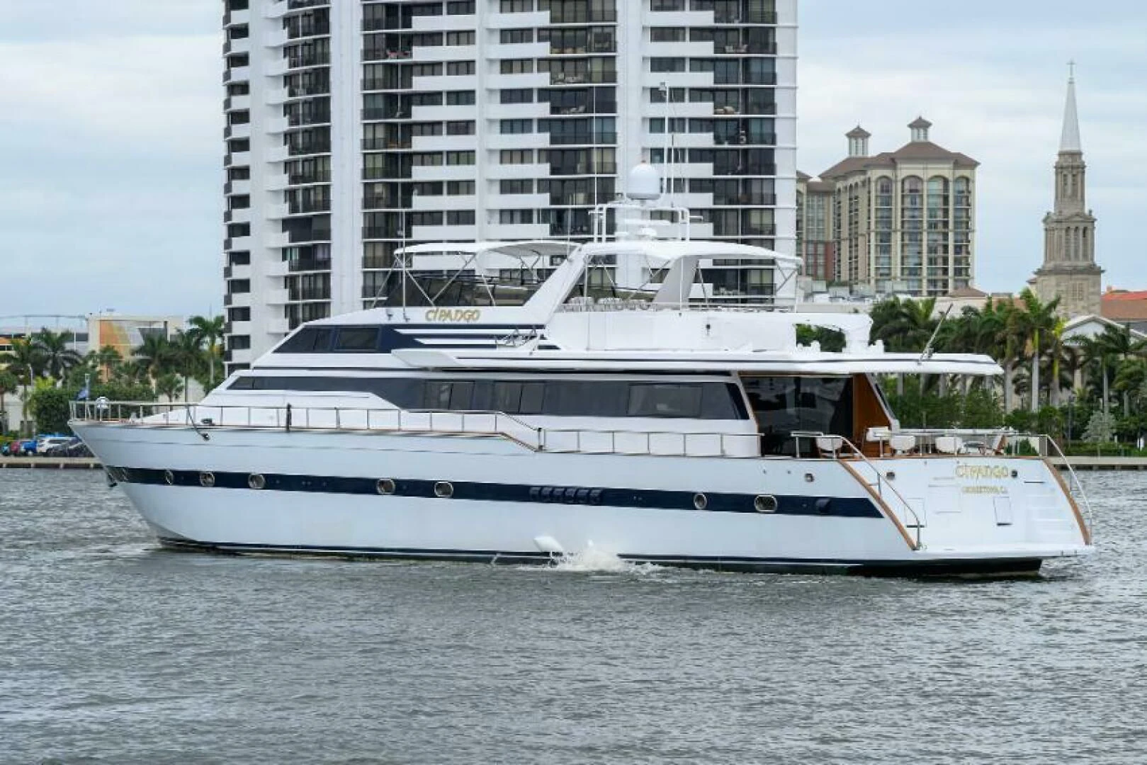 a white yacht in the water aboard CIPANGO Yacht for Sale