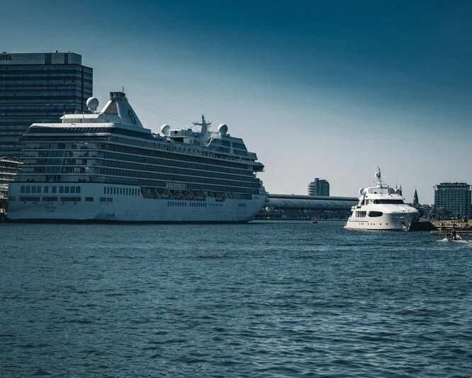 a large cruise ship in the water aboard ARCTIC PRIDE II Yacht for Sale