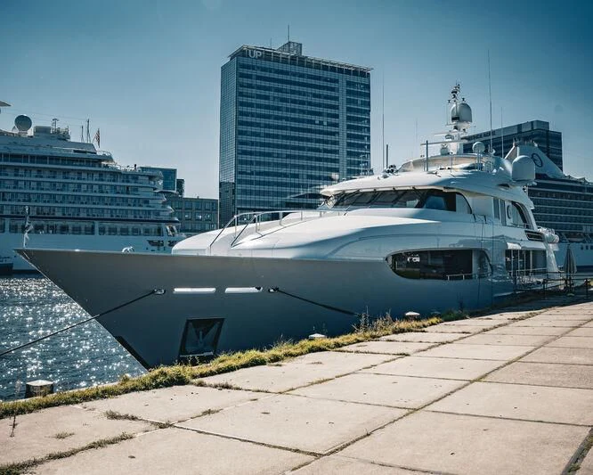 a boat parked on the side of a road aboard ARCTIC PRIDE II Yacht for Sale