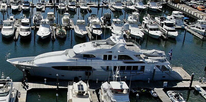 a large yacht docked at a pier aboard ARCTIC PRIDE II Yacht for Sale