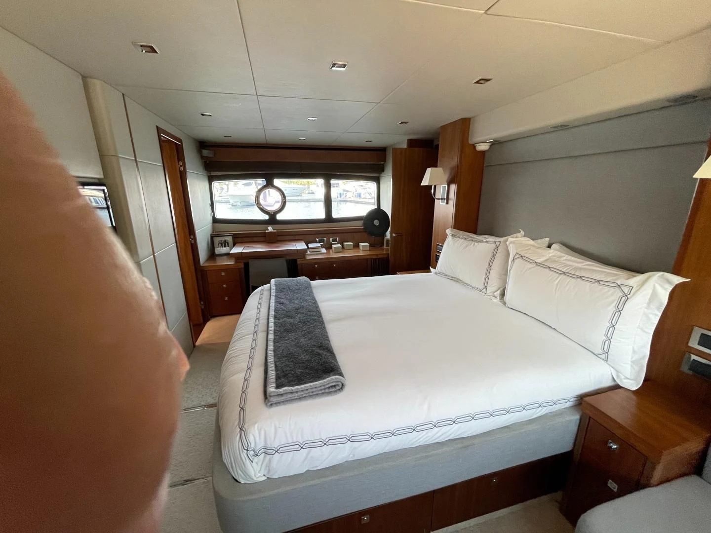 a bed with white sheets aboard TRAINERA Yacht for Sale