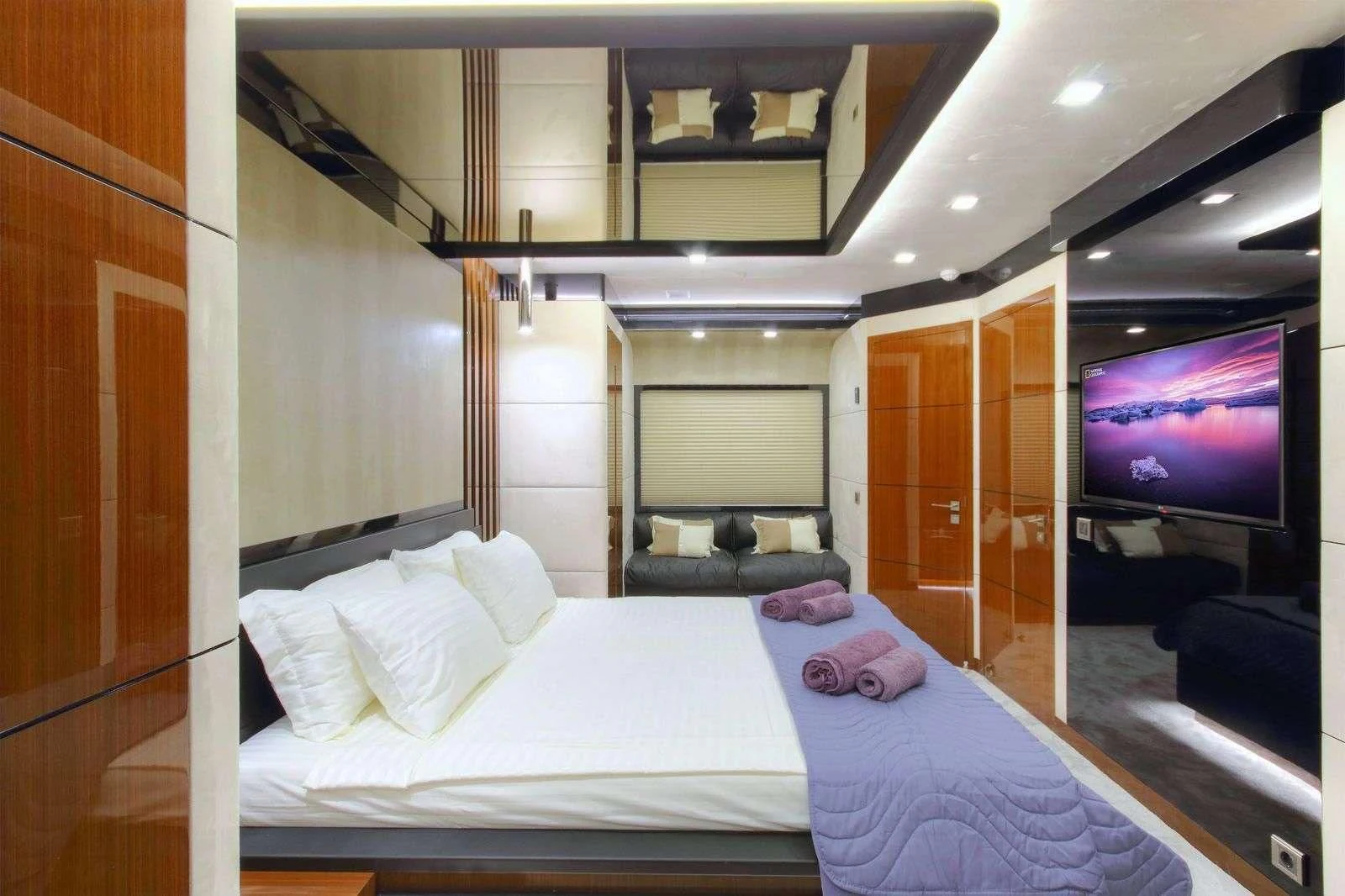 a bed in a room aboard MOSS Yacht for Sale