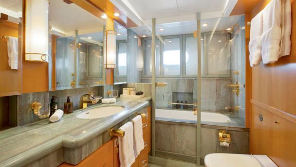 a bathroom with a large mirror aboard HERCULES Yacht for Sale