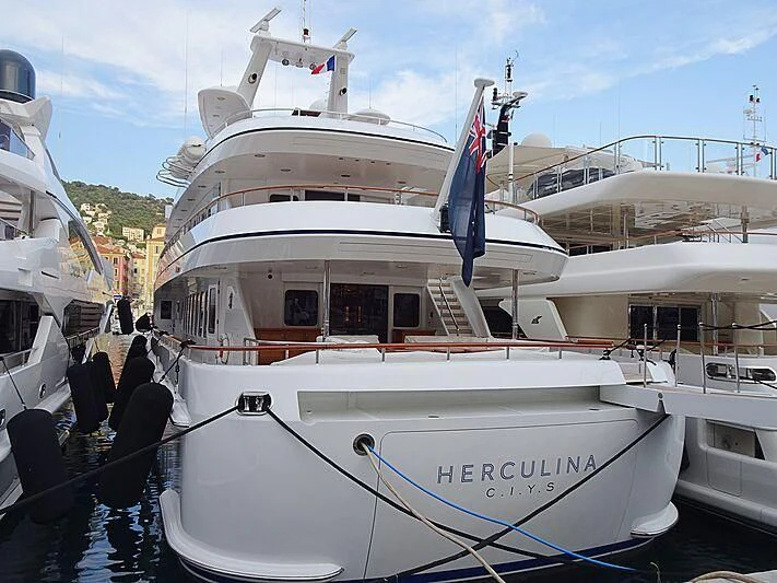 a couple of boats are parked in a harbor aboard HERCULES Yacht for Sale
