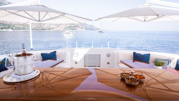 a table with food on it aboard HERCULES Yacht for Sale