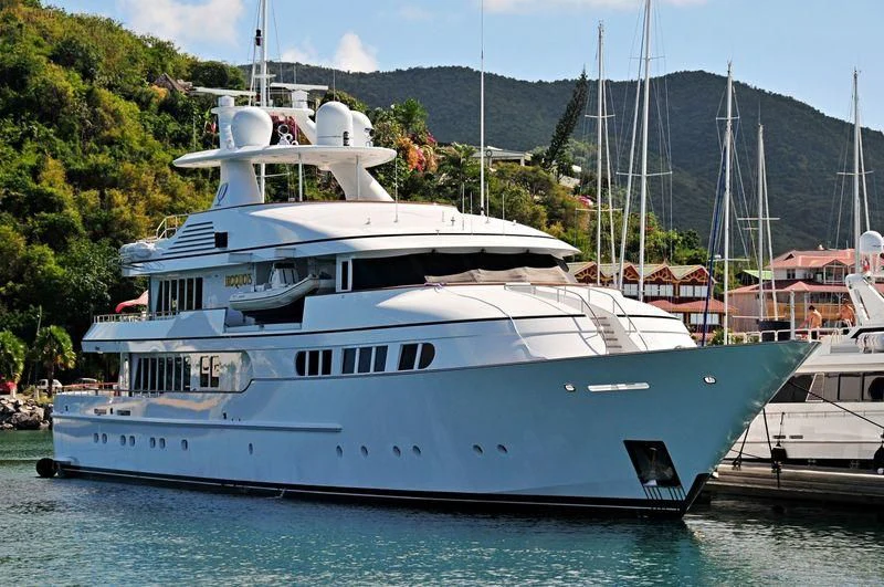a large white boat in the water aboard HERCULES Yacht for Sale