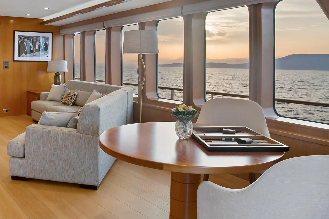 a living room with a large window aboard HERCULES Yacht for Sale