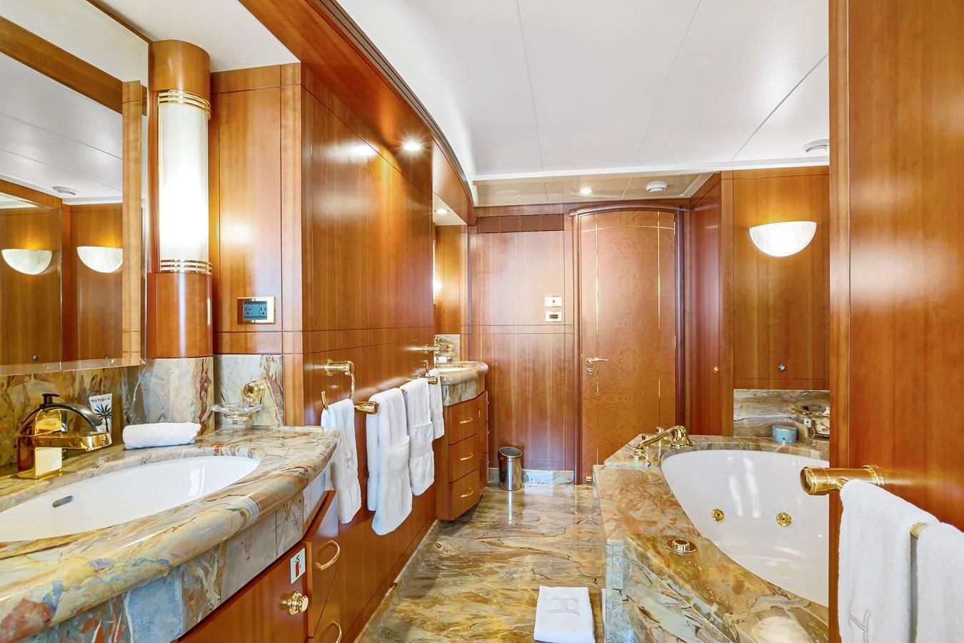 a bathroom with a large mirror aboard HERCULES Yacht for Sale