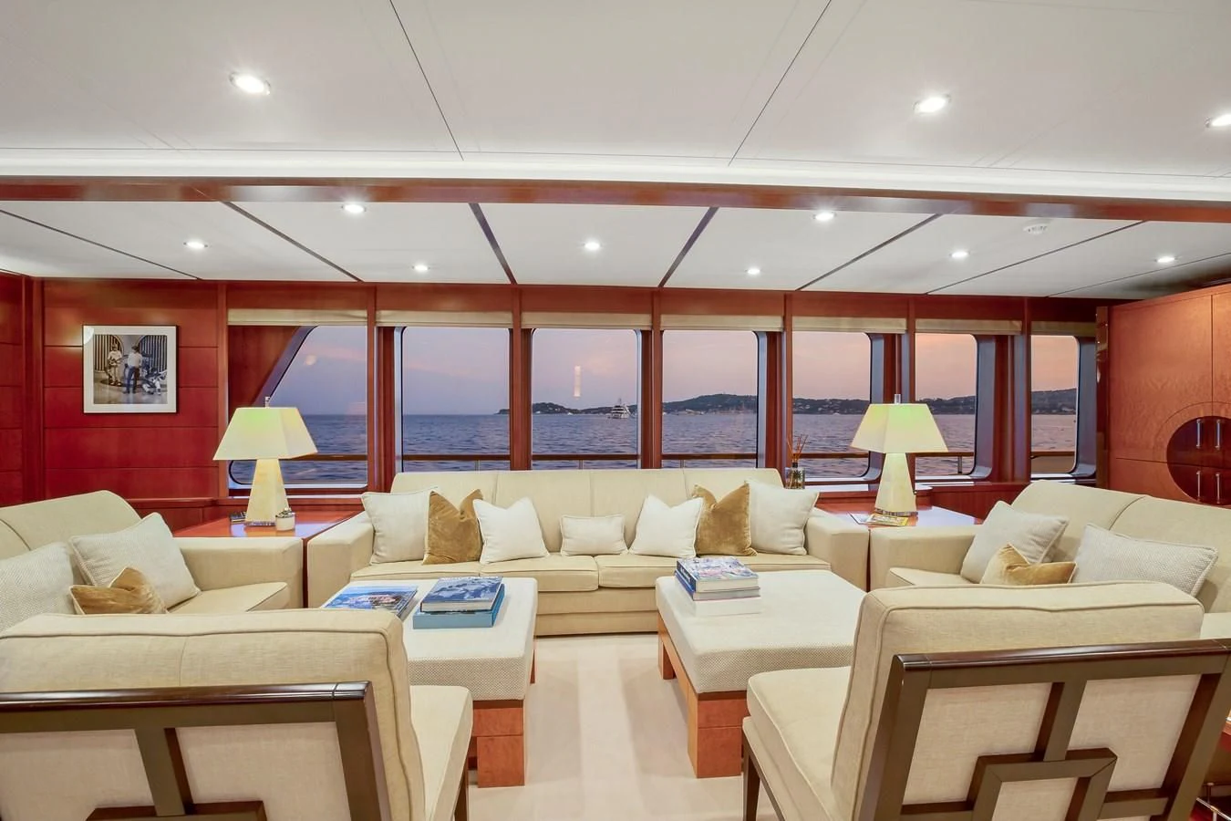 a living room with a large window aboard HERCULES Yacht for Sale