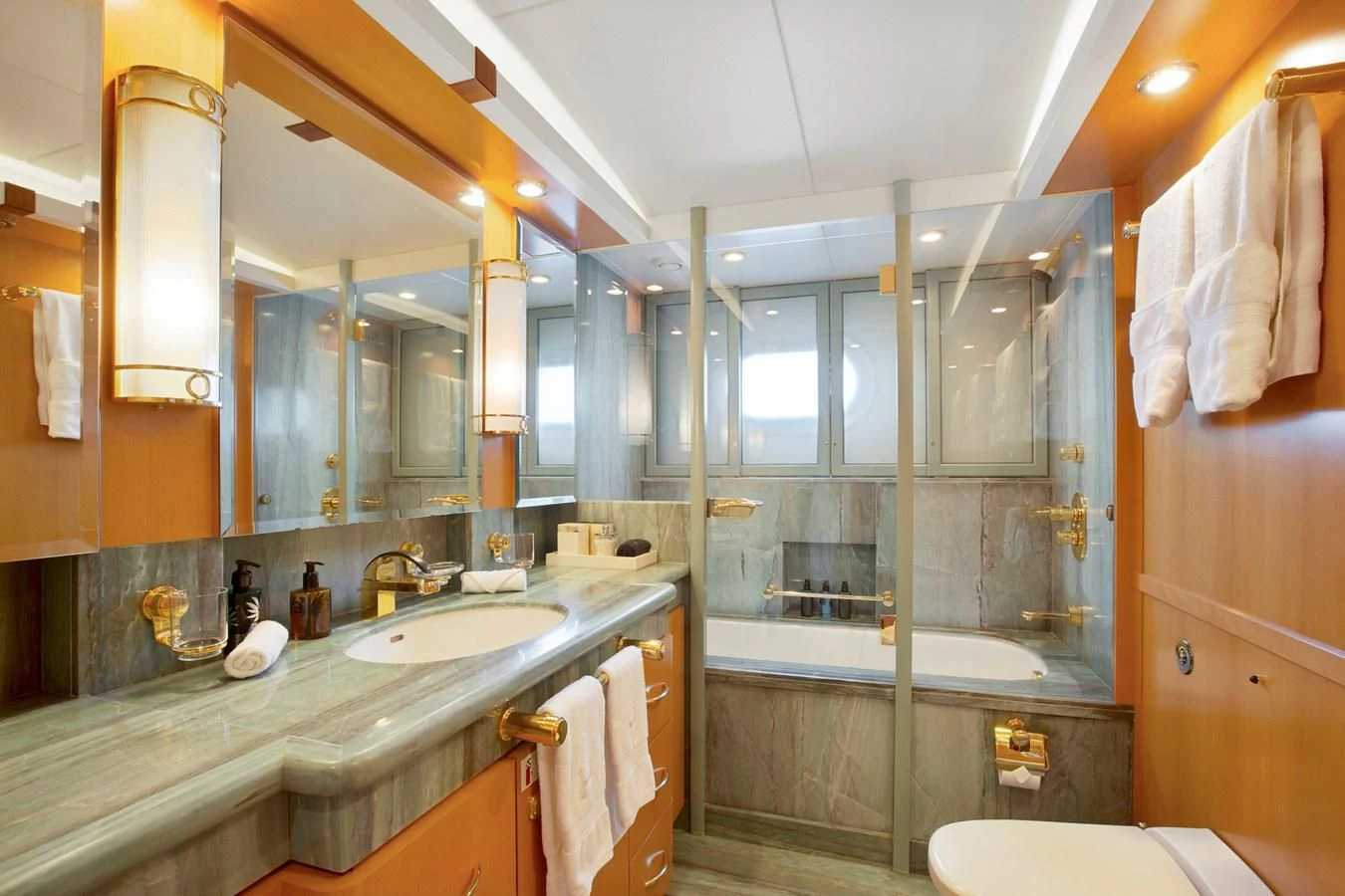 a bathroom with a large mirror aboard HERCULES Yacht for Sale