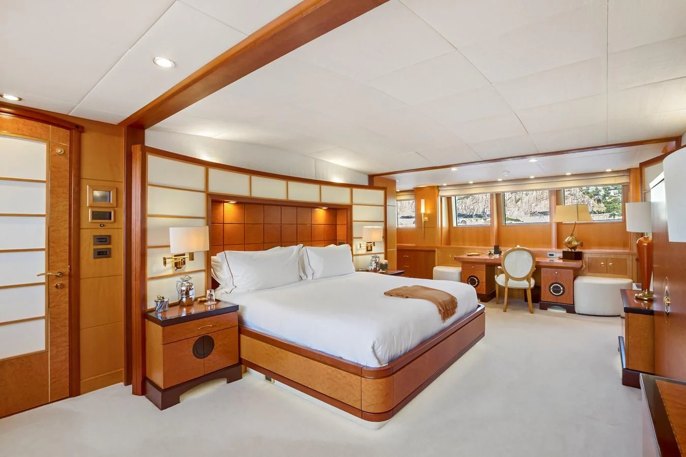 a large bedroom with a large bed aboard HERCULES Yacht for Sale