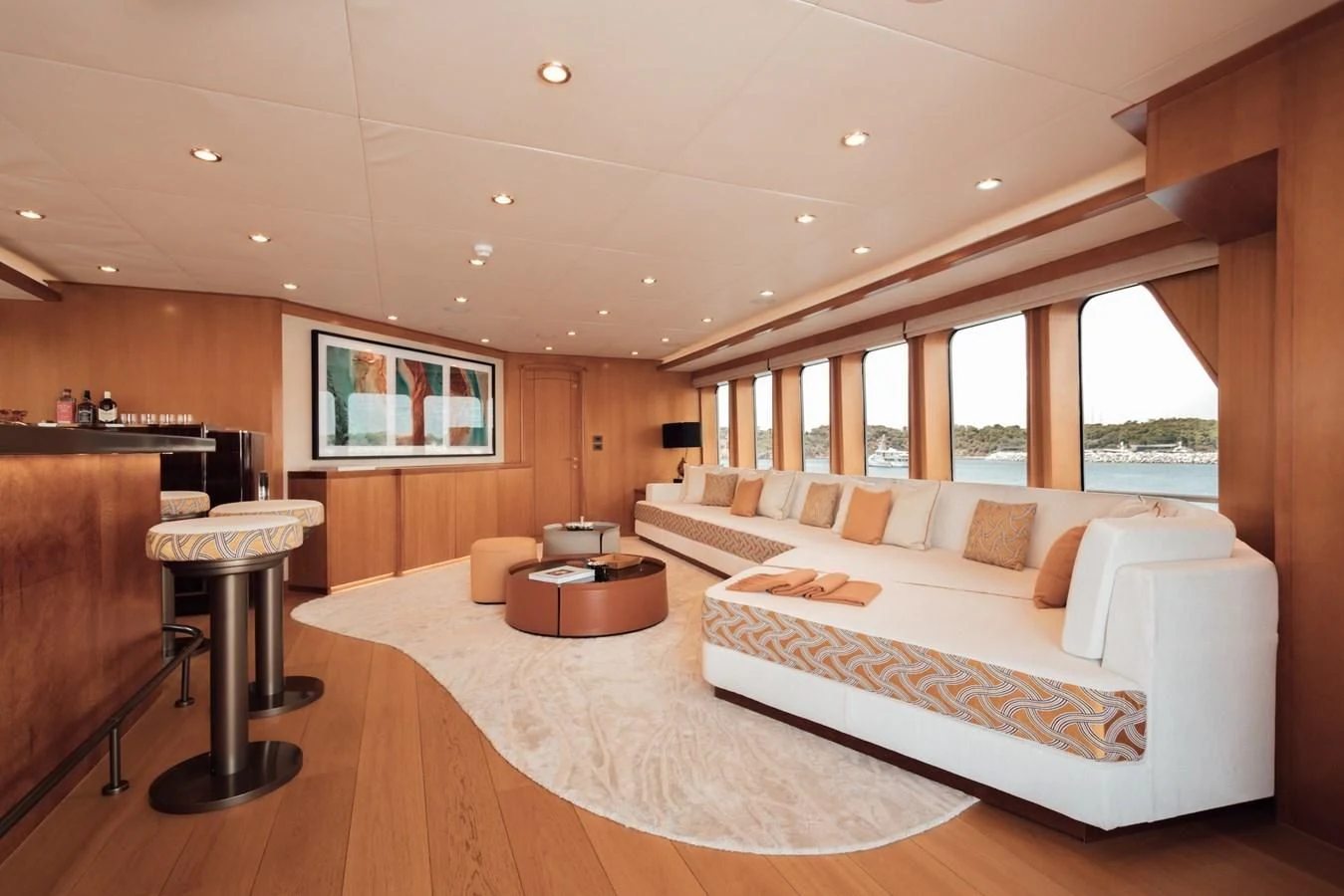a large modern bedroom with a large bed and a large window aboard HERCULES Yacht for Sale