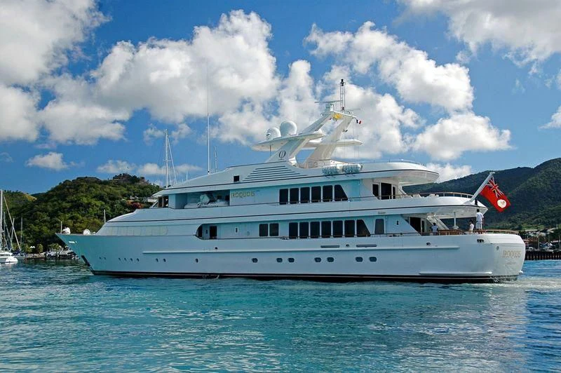 a large white boat in the water aboard HERCULES Yacht for Sale