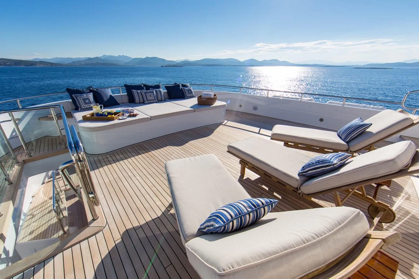 a large deck with a large body of water and a large boat aboard HERCULES Yacht for Sale
