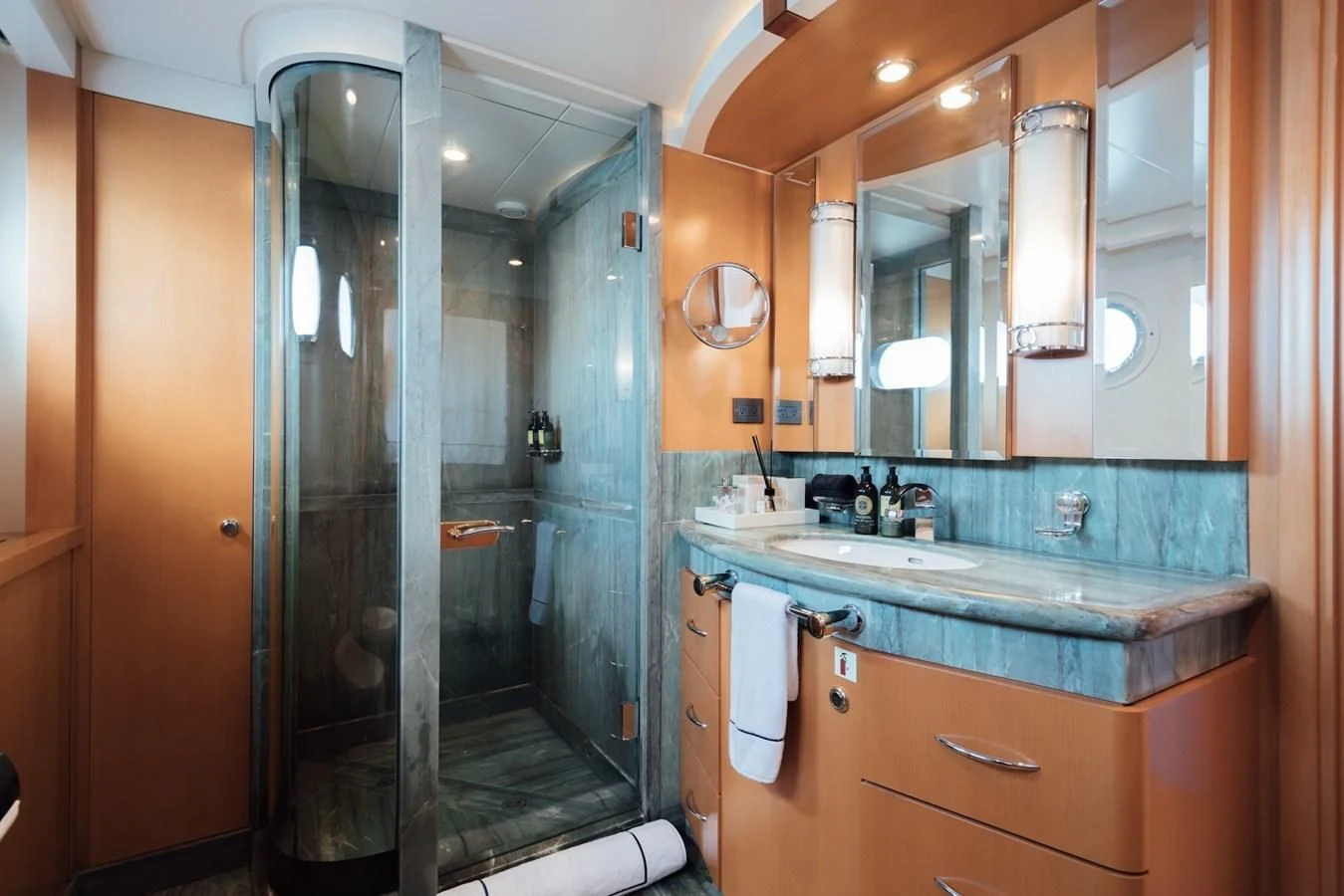 a bathroom with a glass shower aboard HERCULES Yacht for Sale