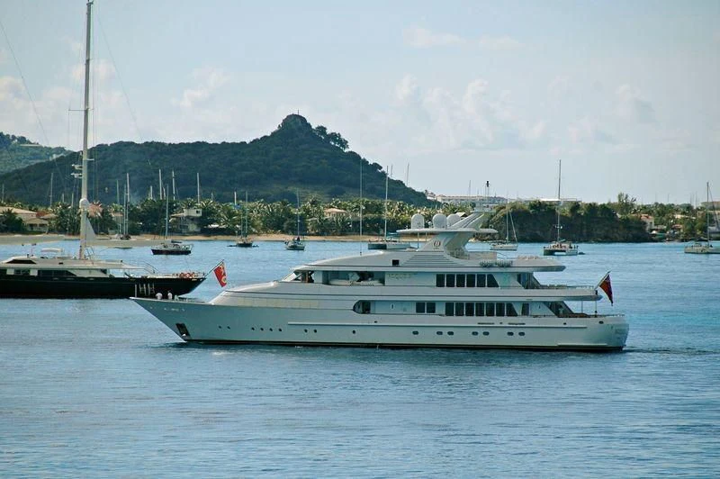 a white yacht in the water aboard HERCULES Yacht for Sale