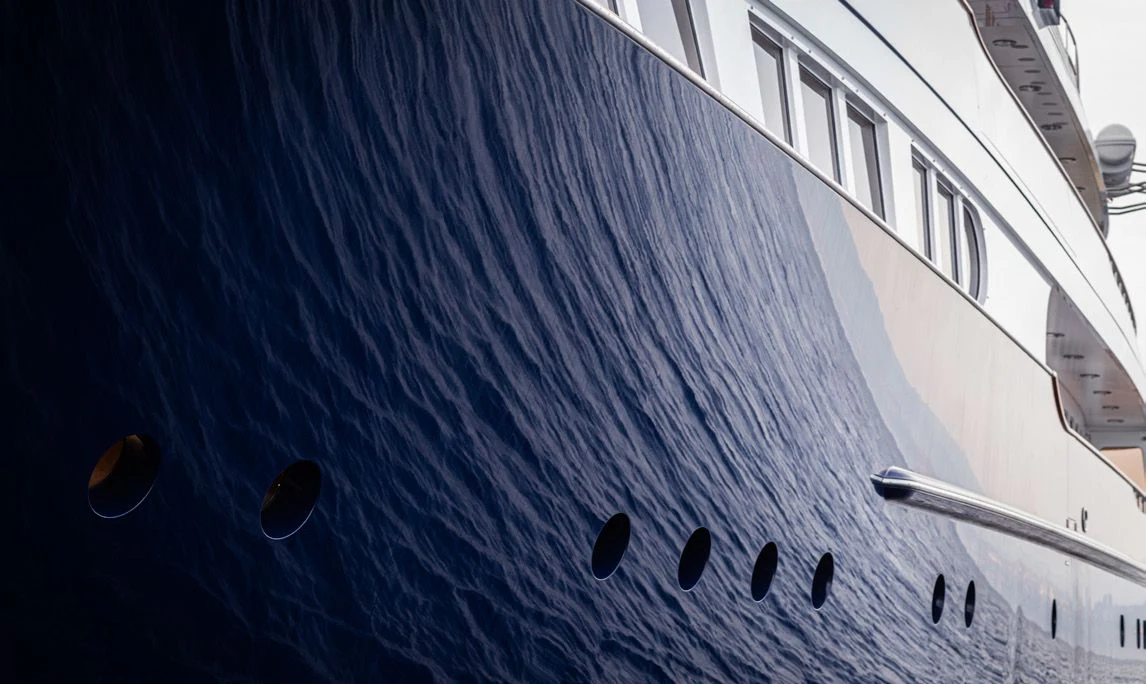 a close-up of a white airplane aboard HERCULES Yacht for Sale