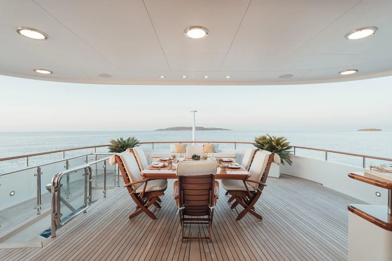 a room with a table and chairs aboard HERCULES Yacht for Sale