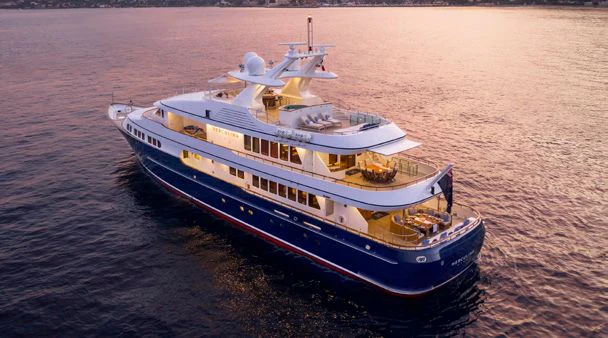 a large boat in the water aboard HERCULES Yacht for Sale