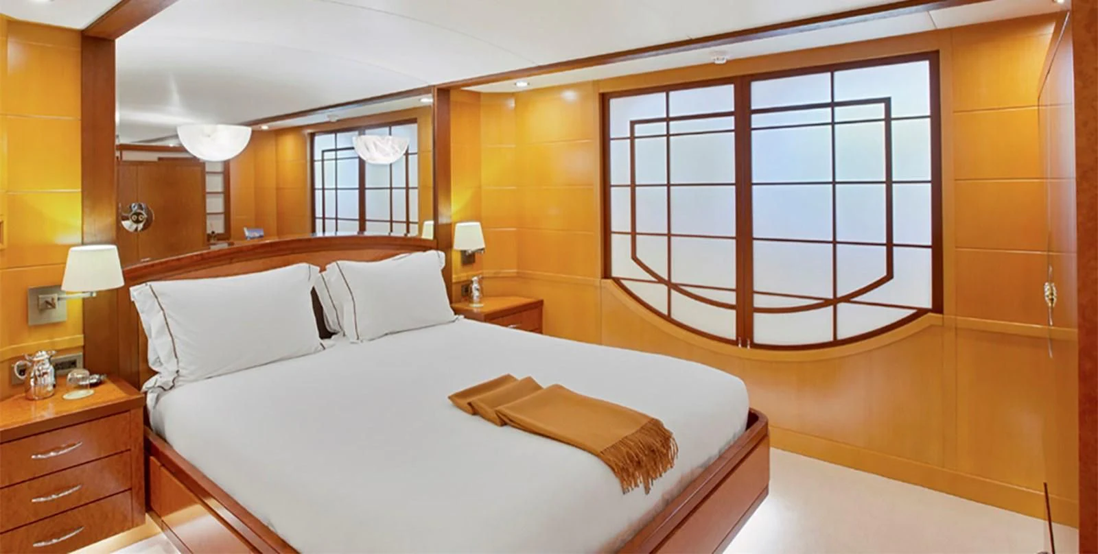 a hotel room with a large bed aboard HERCULES Yacht for Sale