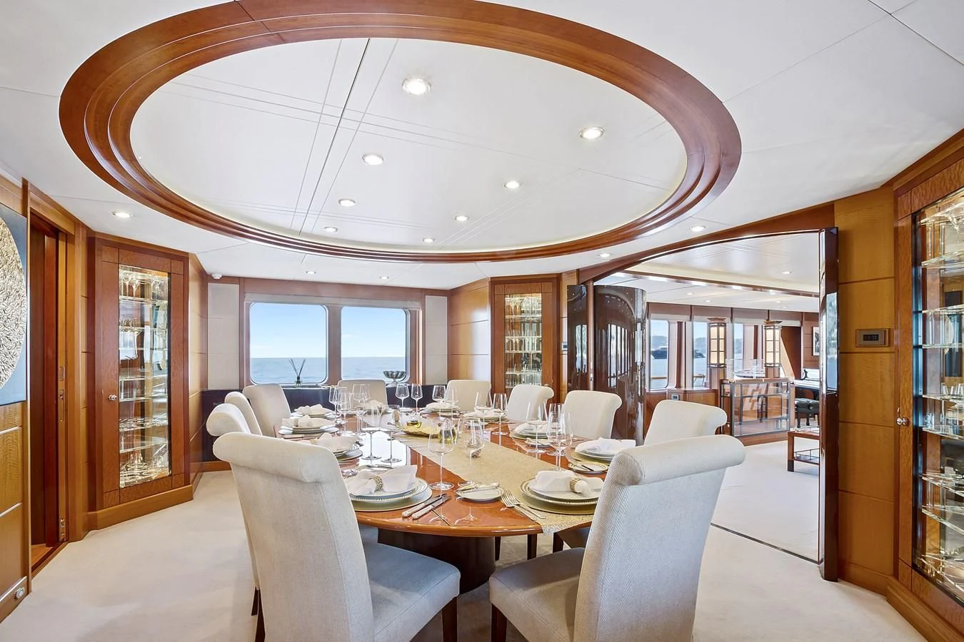 a large dining room with a large open window aboard HERCULES Yacht for Sale