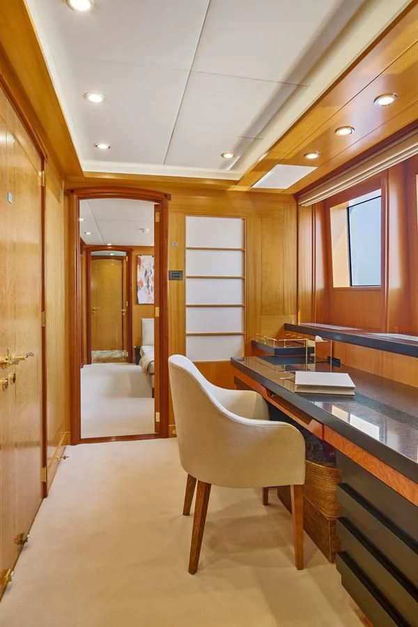 a room with a table and chairs aboard HERCULES Yacht for Sale
