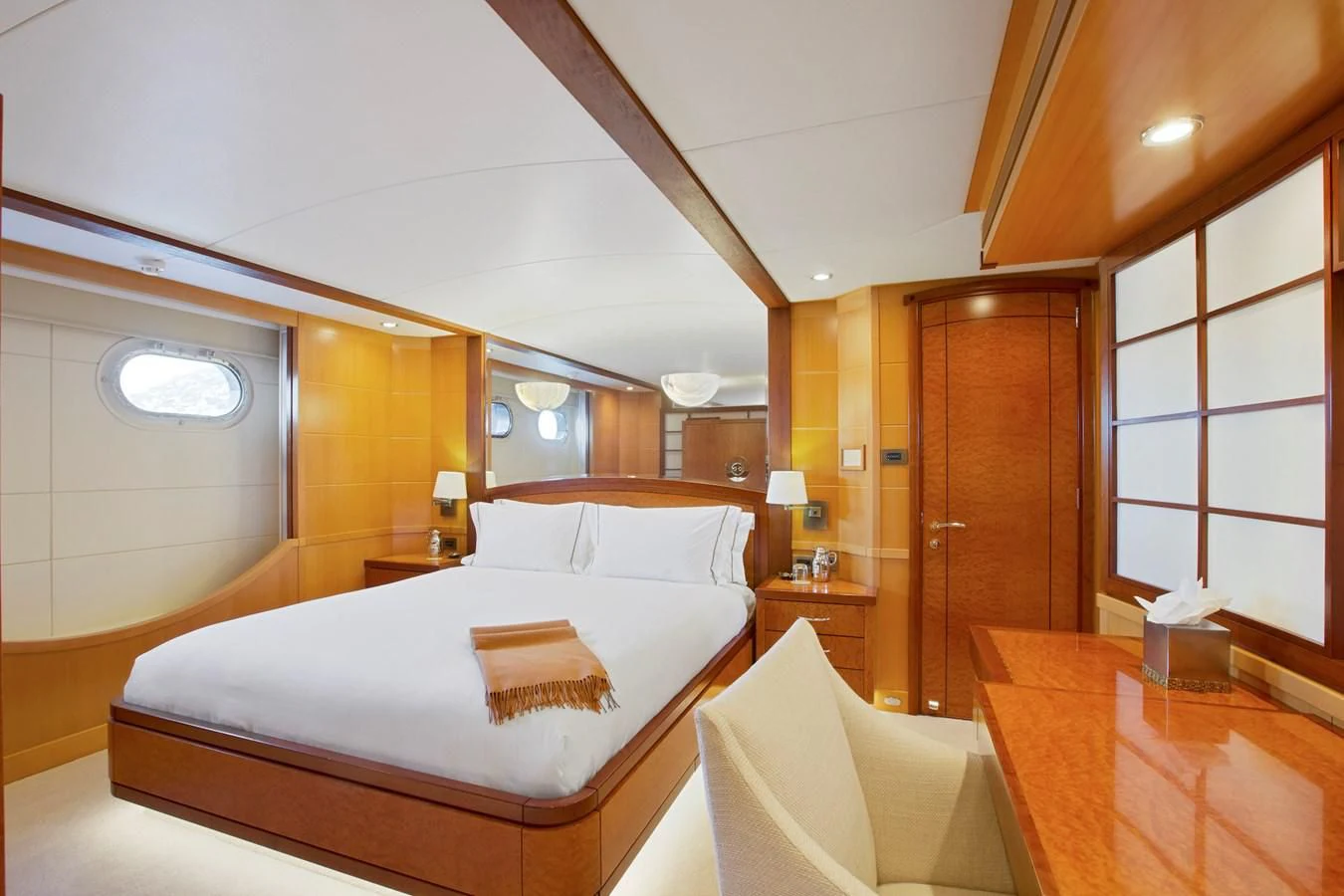a hotel room with a bed and a desk aboard HERCULES Yacht for Sale