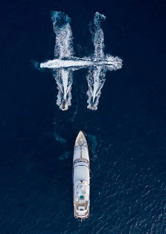 a rocket flying in the sky aboard HERCULES Yacht for Sale