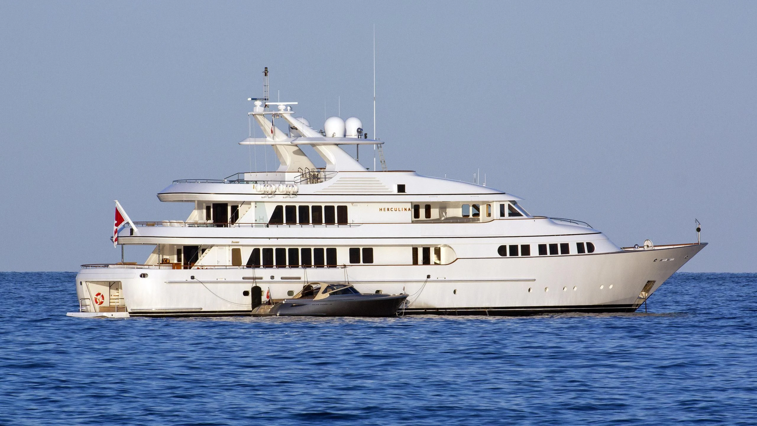 a large white boat aboard HERCULES Yacht for Sale