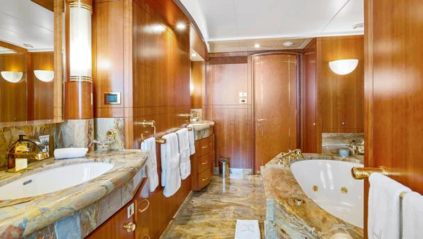a bathroom with a large tub aboard HERCULES Yacht for Sale