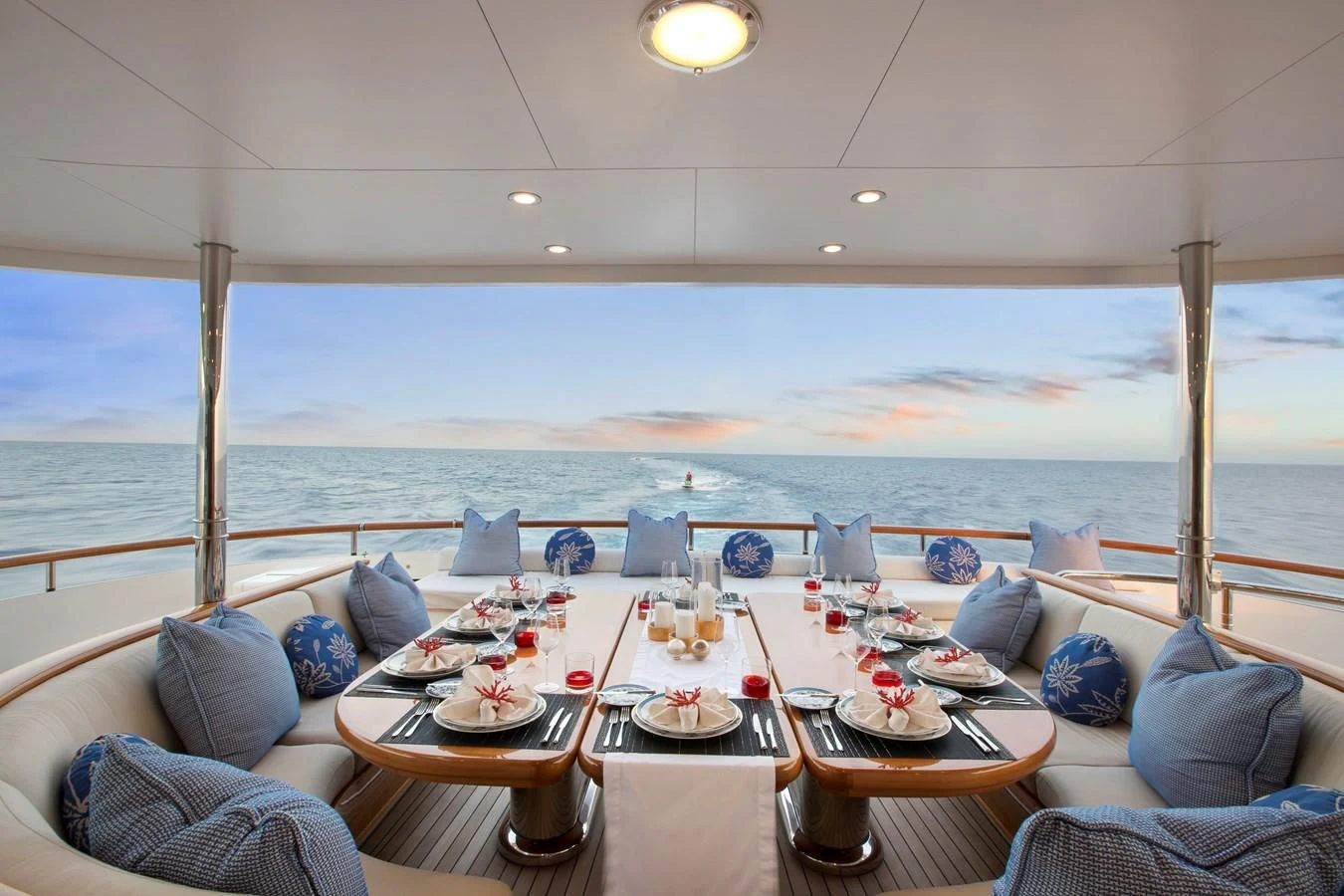 a table set for a meal on a boat aboard HERCULES Yacht for Sale
