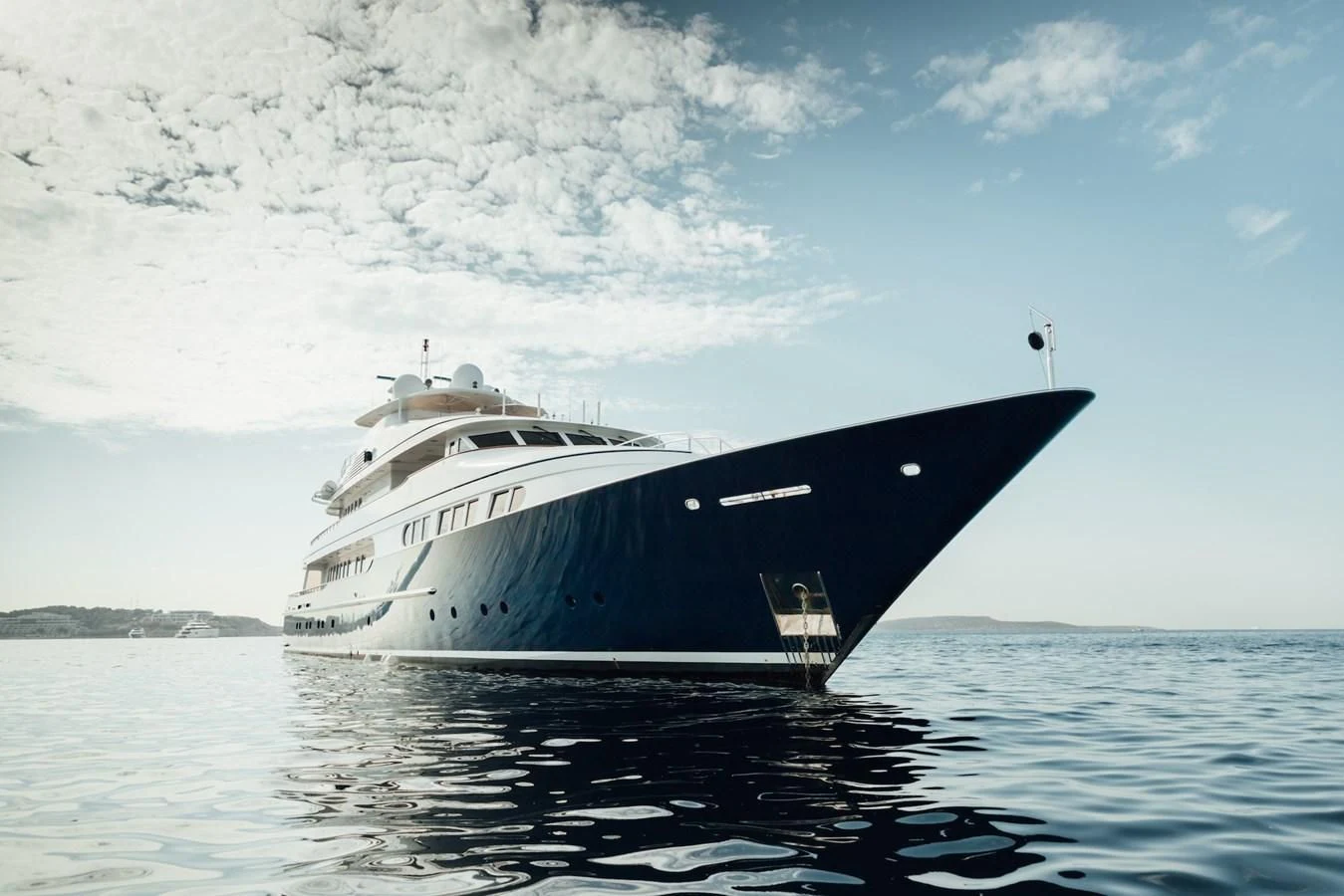a large boat in the water aboard HERCULES Yacht for Sale