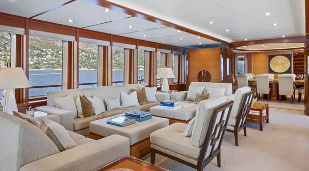 a living room with a large window aboard HERCULES Yacht for Sale