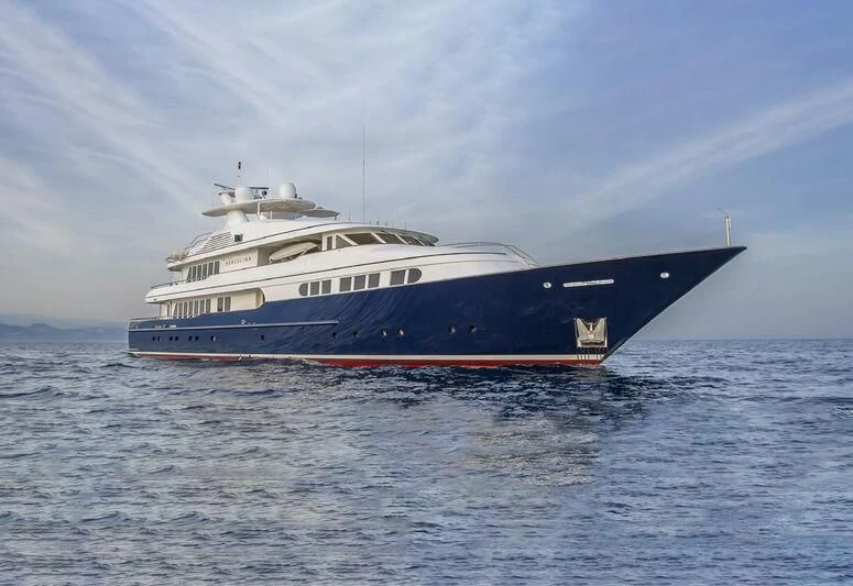 a large ship in the water aboard HERCULES Yacht for Sale