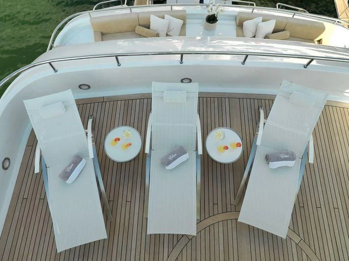 a table with chairs and a table aboard EILEEN Yacht for Sale