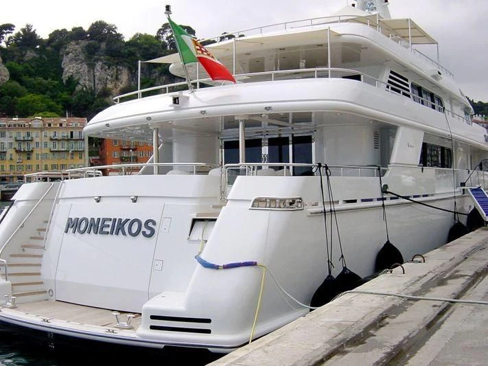 a boat with a flag on the front aboard EILEEN Yacht for Sale
