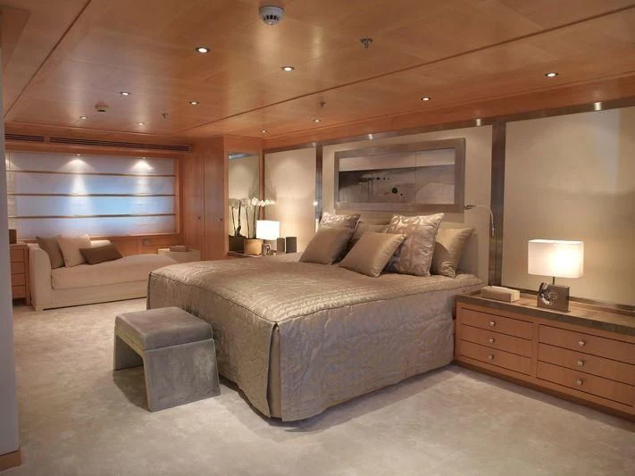 a large bed in a room aboard EILEEN Yacht for Sale