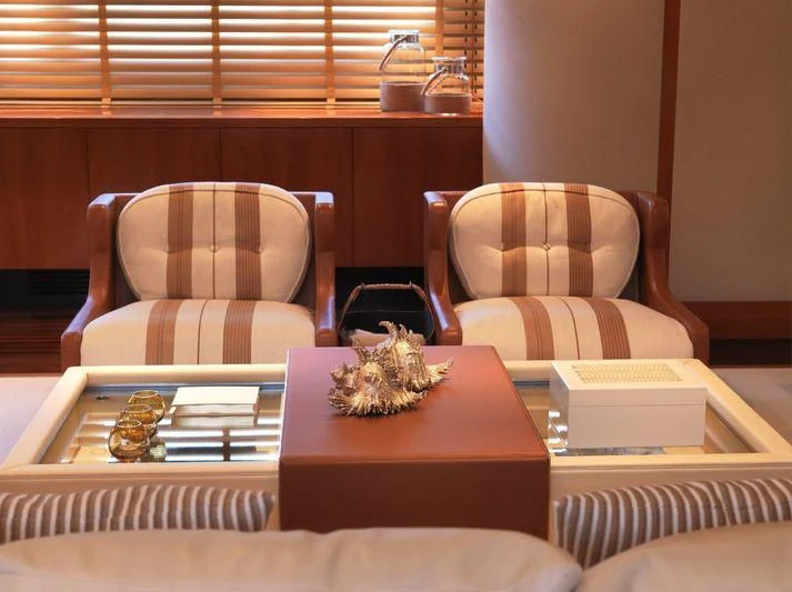 a room with a table and chairs aboard EILEEN Yacht for Sale