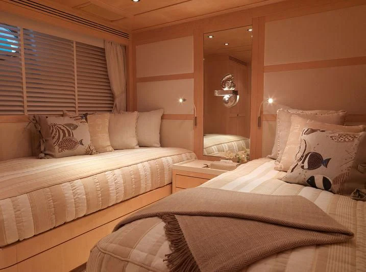 a couple of beds in a hotel room aboard EILEEN Yacht for Sale