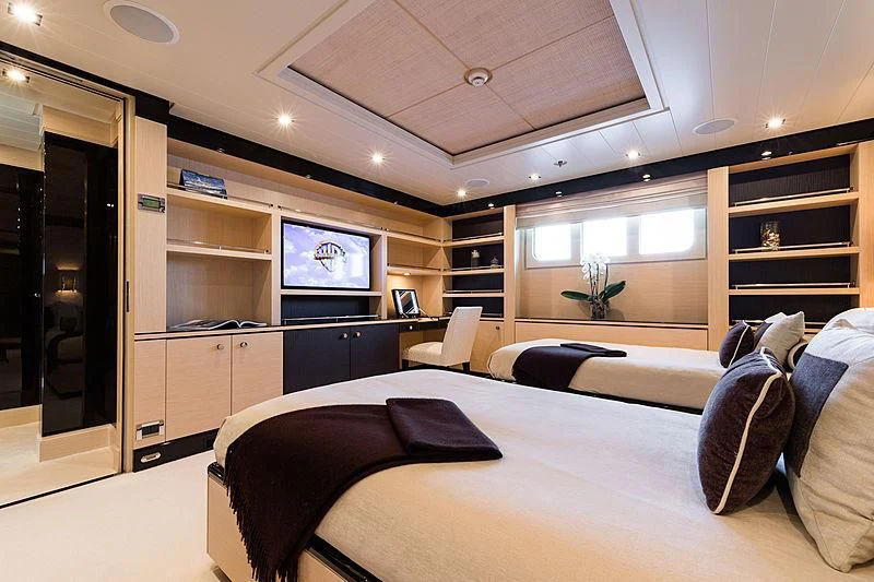 a bedroom with a large bed aboard GRACE (YET) Yacht for Sale