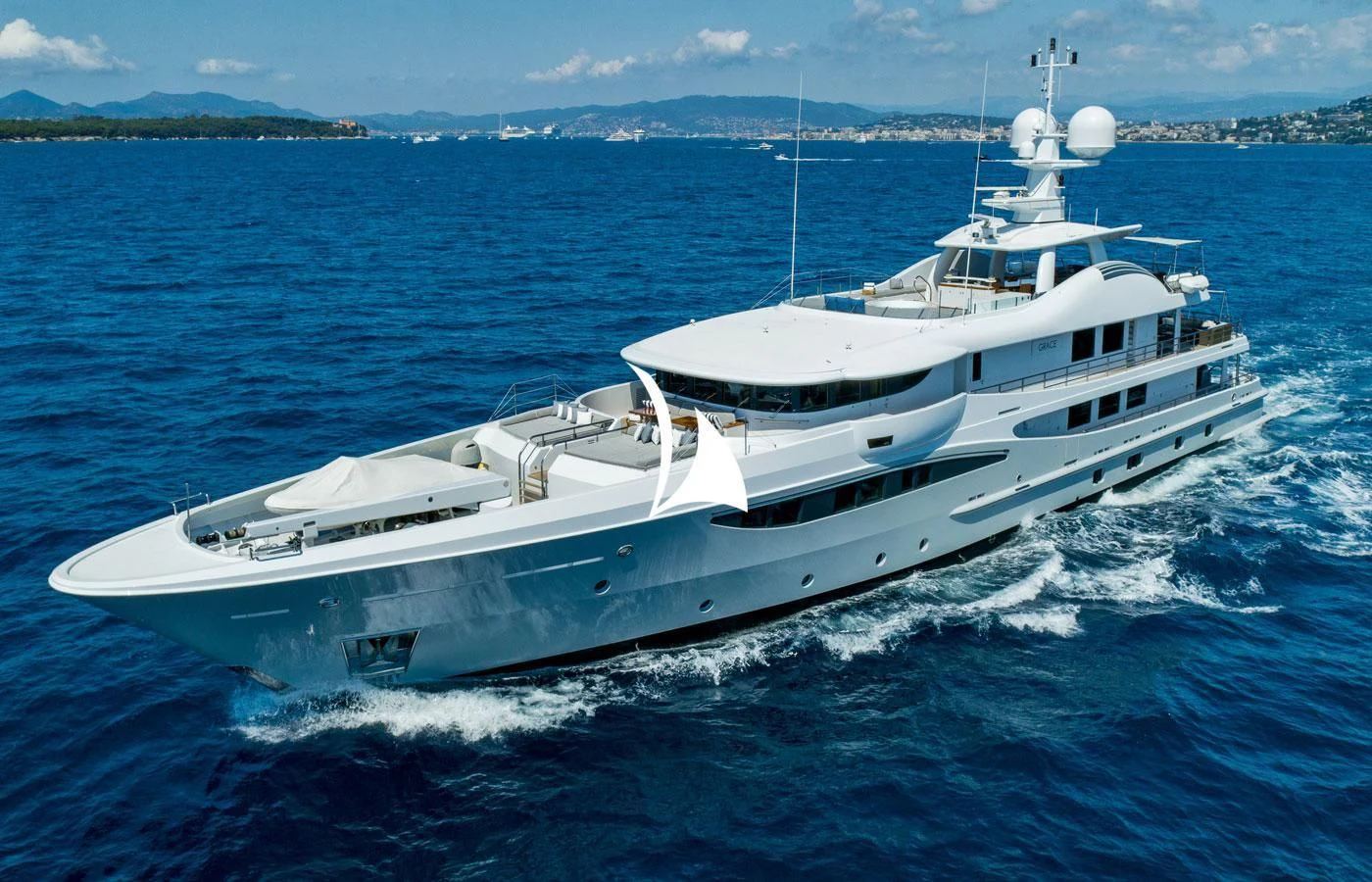 a white yacht on the water aboard GRACE (YET) Yacht for Sale