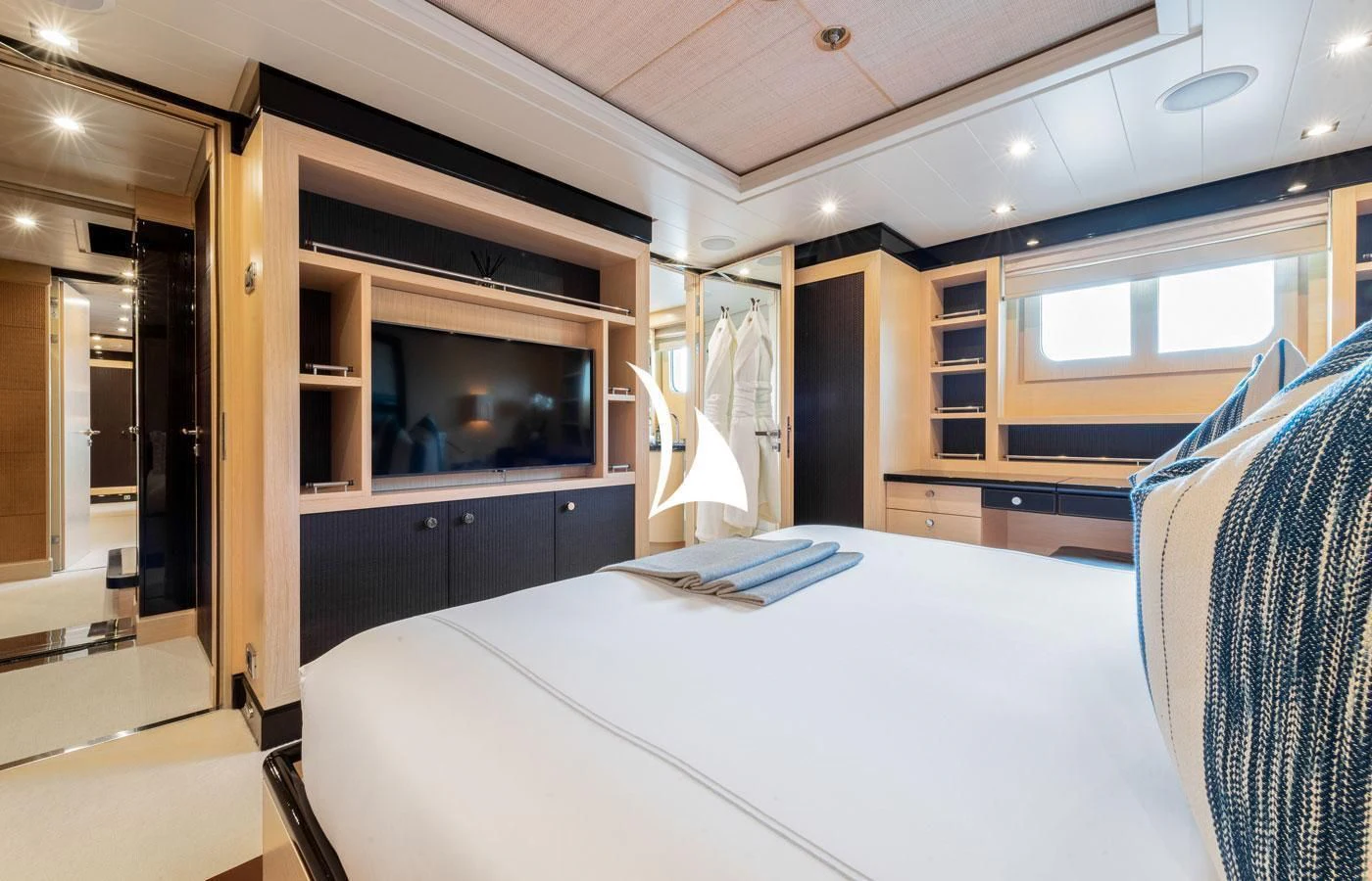a room with a bed and a television aboard GRACE (YET) Yacht for Sale