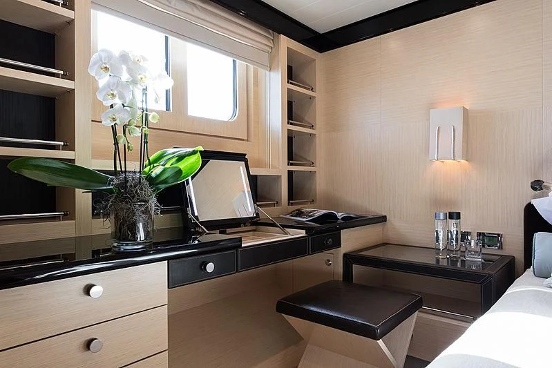 a room with a desk and a laptop aboard GRACE (YET) Yacht for Sale