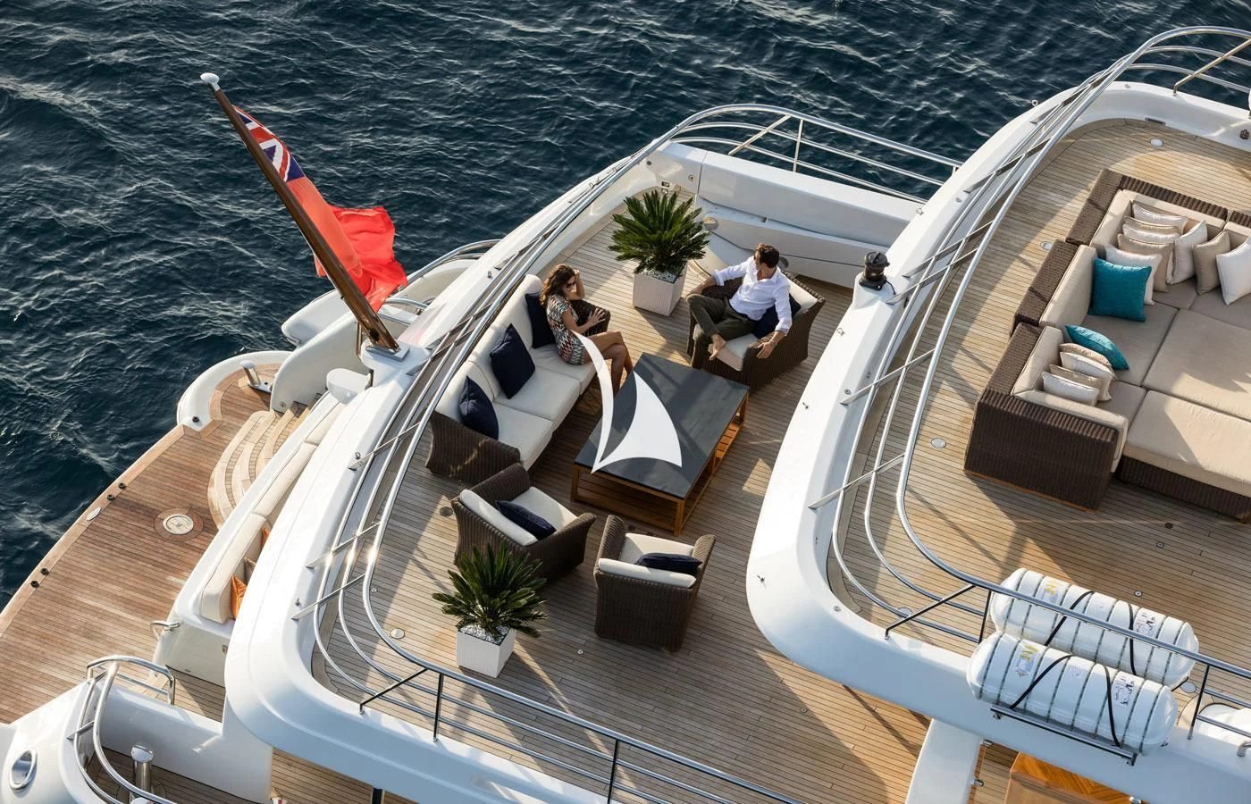 a couple sitting on a boat aboard GRACE (YET) Yacht for Sale