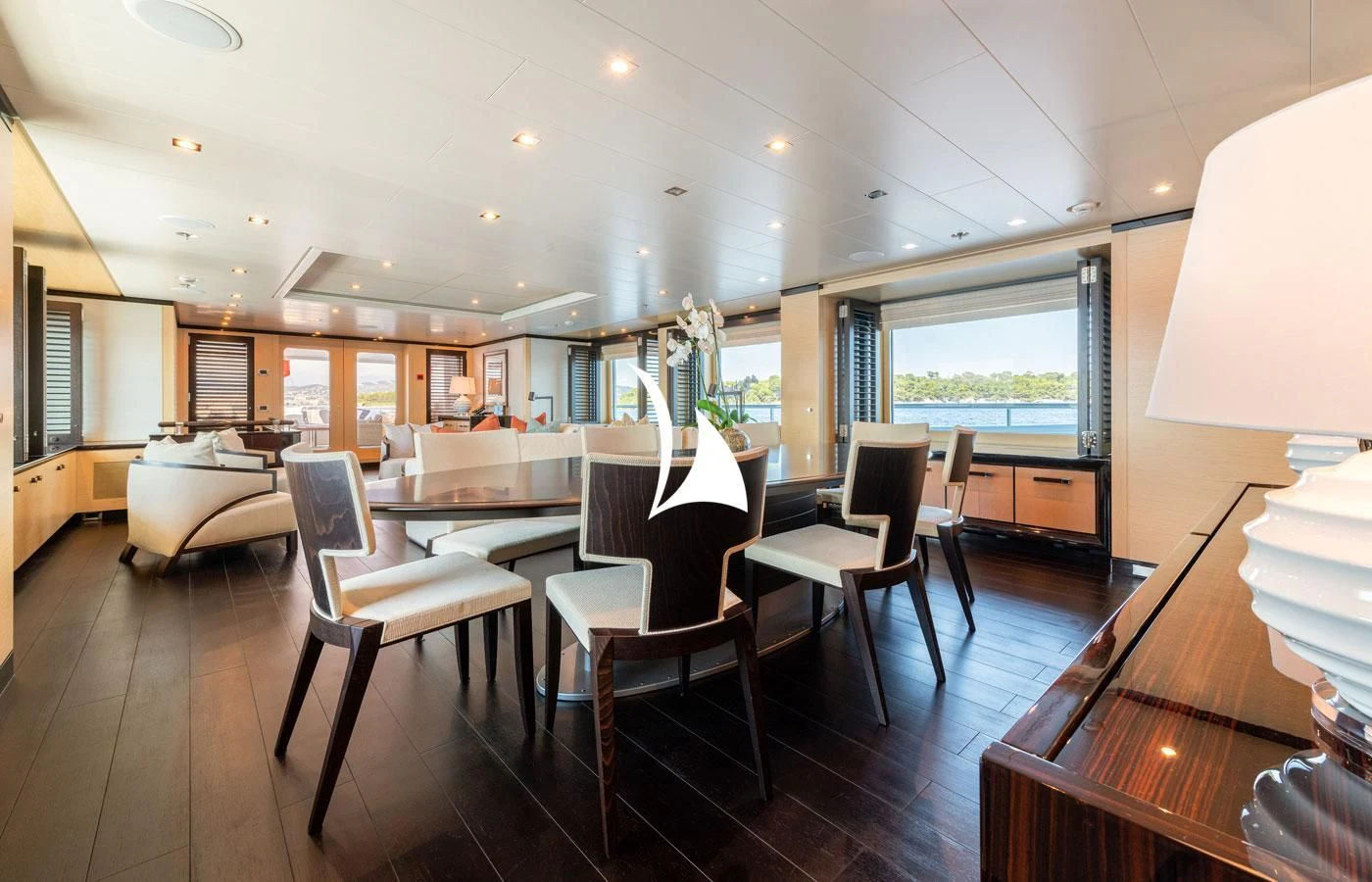 a room with a table chairs and a bed aboard GRACE (YET) Yacht for Sale